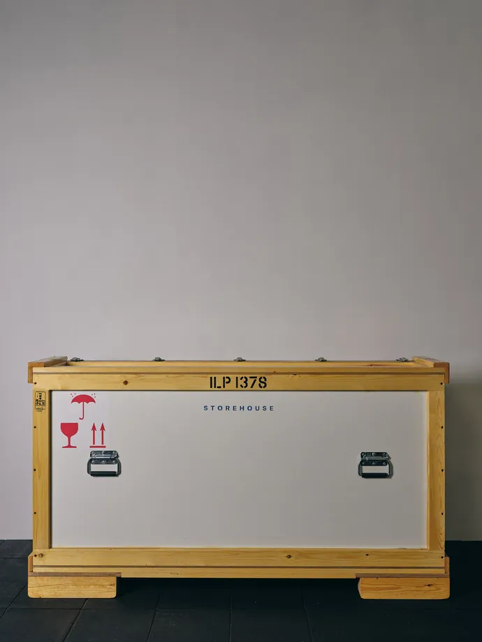 A finished timber crate, marked and labelled.