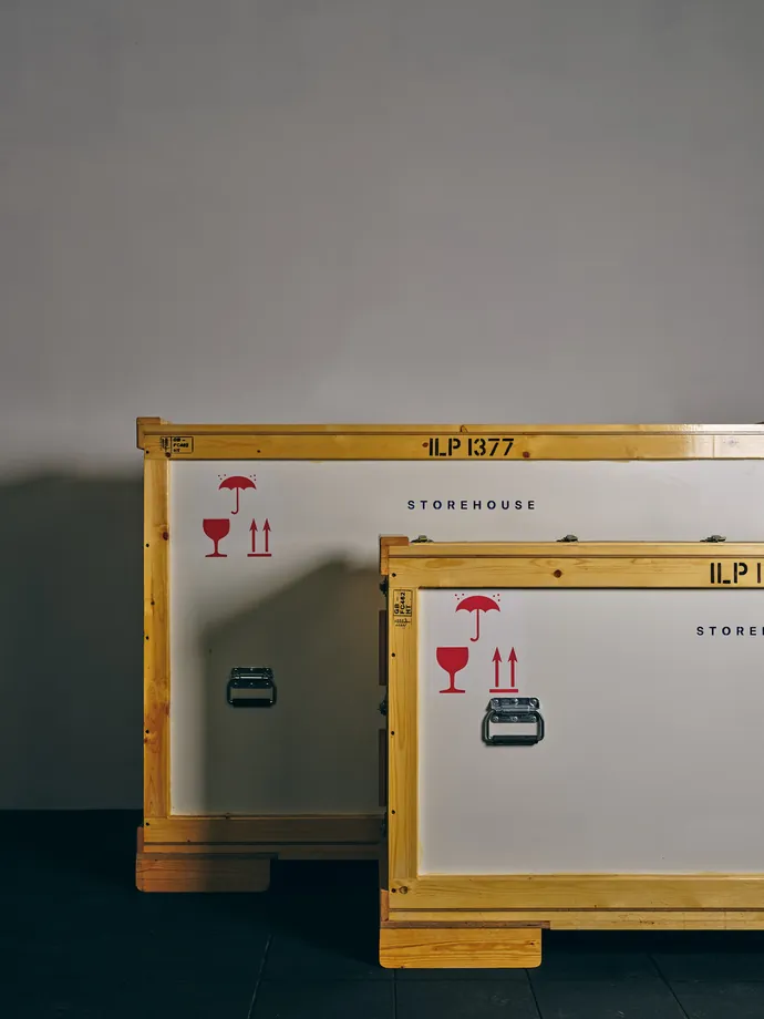 Marked crates standing together inside the facility.
